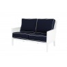 Sunset West Regatta Loveseat With Cushions In Canvas Navy With Canvas White Welt - Angled