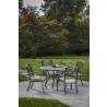 Barcelona Cast Aluminum Dining Set With 48" Round Dining Table With Umbrella Hole and 4 Stackable Dining Arm Chairs with Cushions